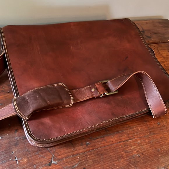 Leather messenger bag never used no tags.